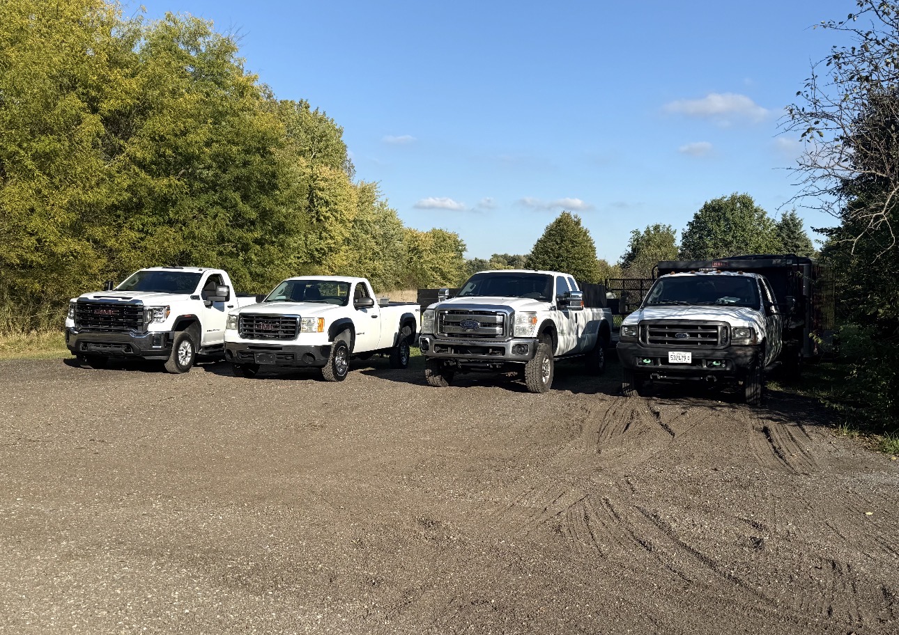 Nick's Lawncare fleet of trucks ready for commercial and residential landscaping work in Lockport, Illinois